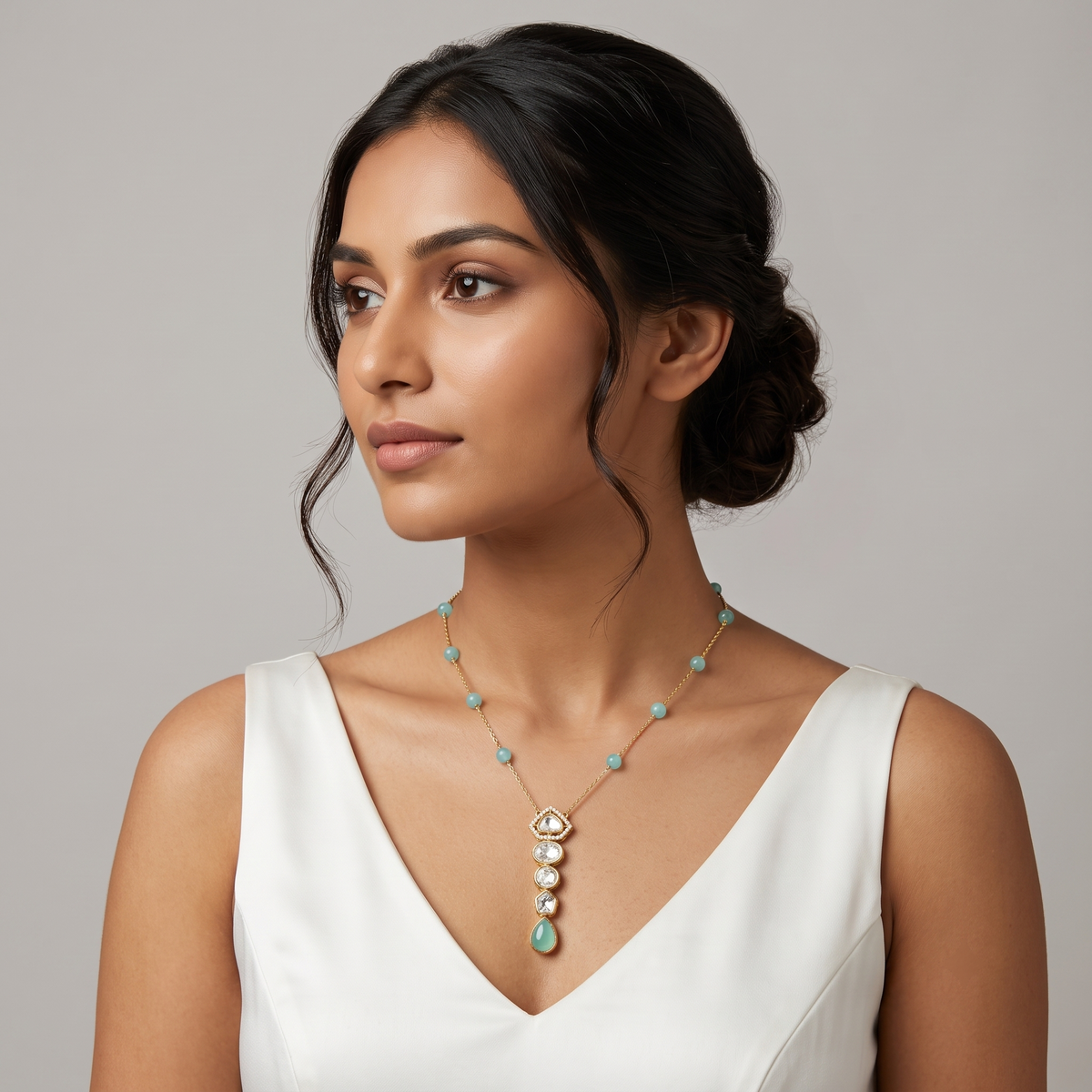 Polki And Emerald Long Tie Pattern Necklace in 9/14/18kt gold, at Inarra Atelier Saltlake