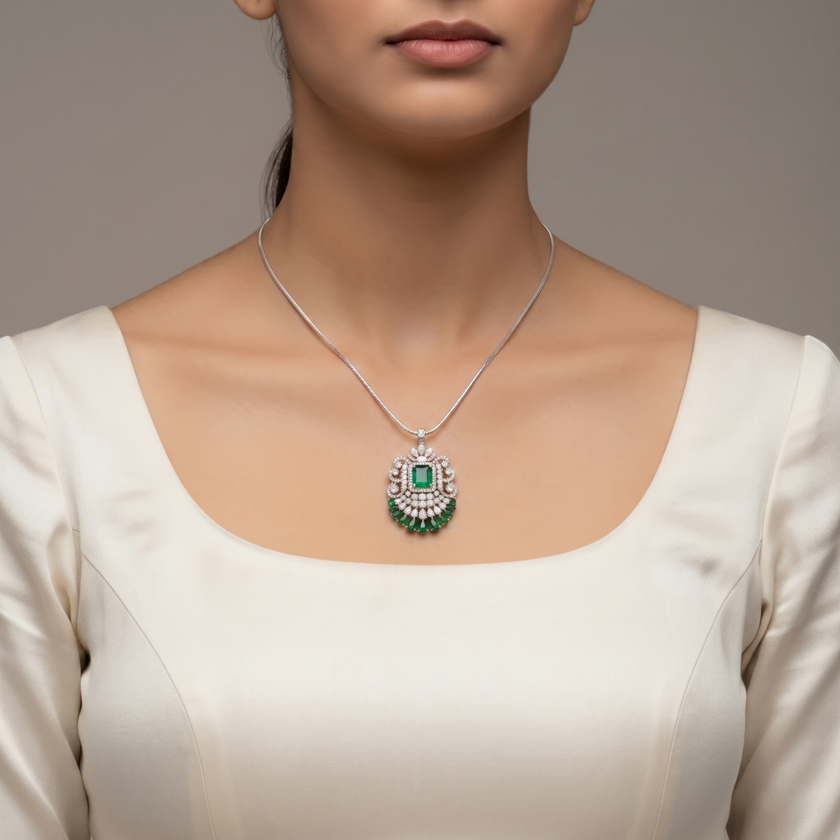 Emerald Heirloom Pendant / Brooch, an emerald heirloom design in 9/14/18kt gold, from Inarra Atelier's Bridal Jewellery Salt Lake range