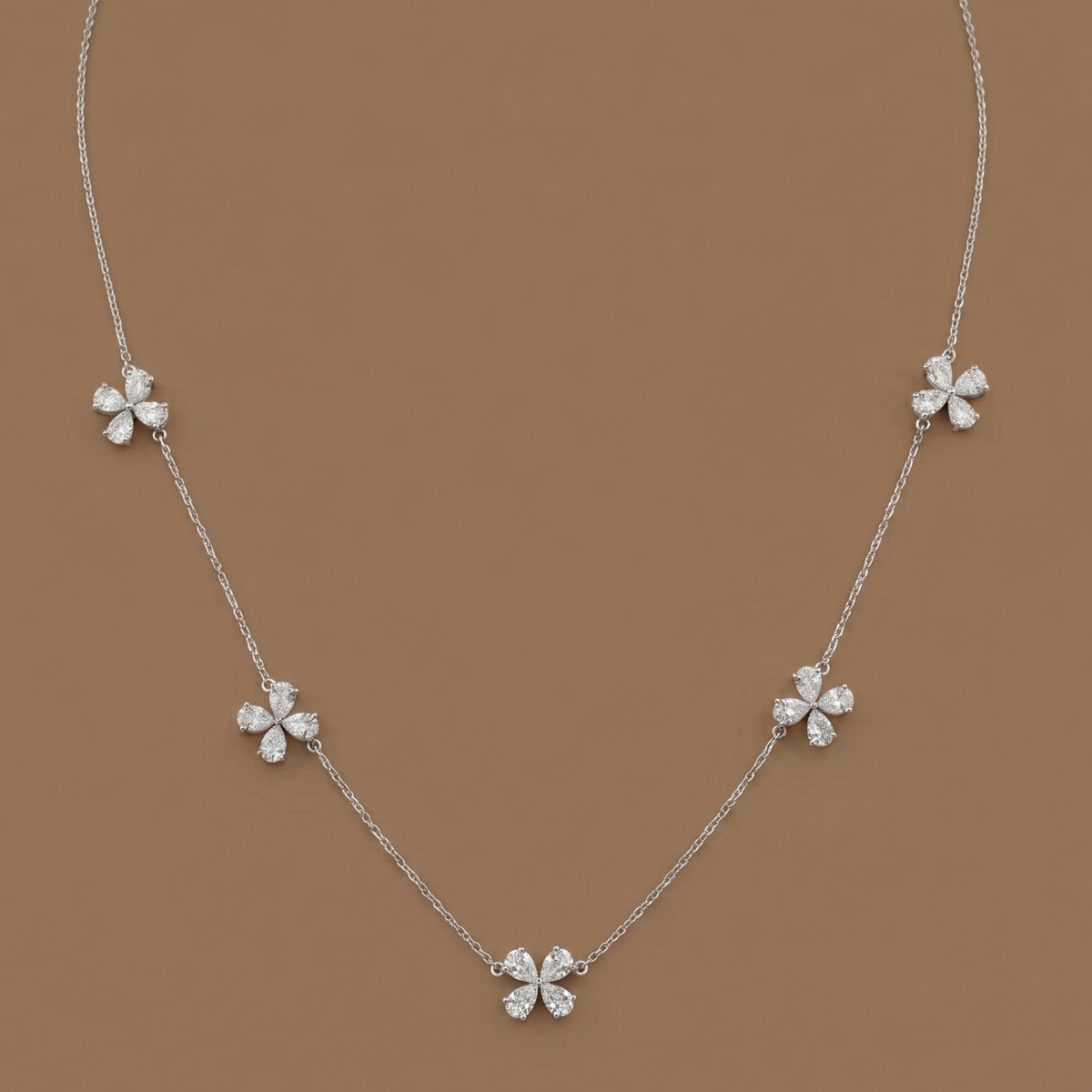 Scintillating Petals Chain Necklace, a petal-motif chain design, 9/14/18kt gold, at Inarra Atelier Kolkata
