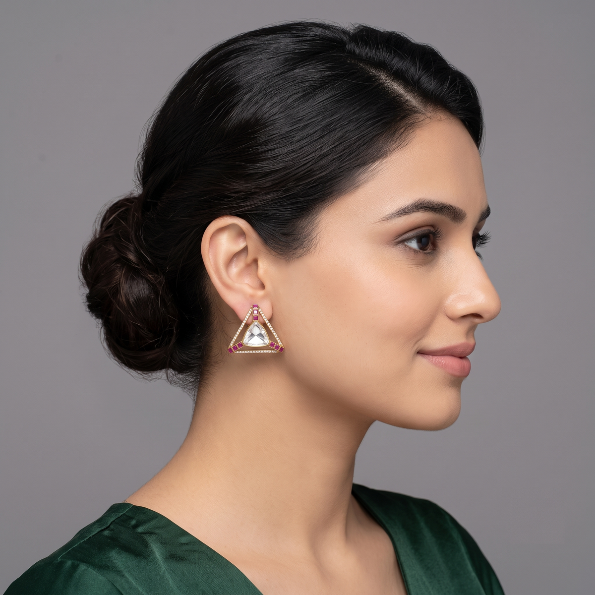 Modern Triangular Polki Studs, trilliant polki with ruby accents in a light gold frame, at Inarra Atelier's Labgrown diamond store Saltlake